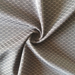 Latest warp knitted 85/15 nylon spandex jacquard knitted hexagonal mesh fabric for sportswear swimwear 