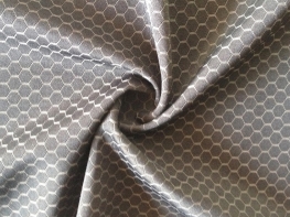 Latest warp knitted 85/15 nylon spandex jacquard knitted hexagonal mesh fabric for sportswear swimwear 